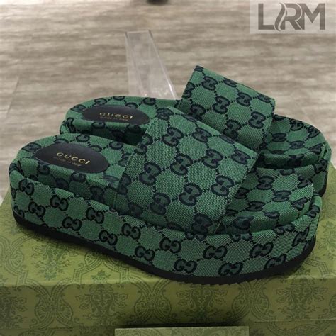 green Gucci platform slides